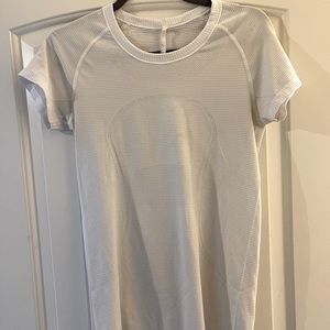 White short sleeve Lululemon top.